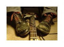 The tired shoes of a ba... by Nichole Flowers